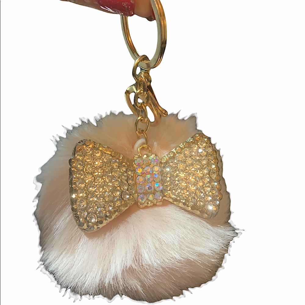 Fluff ball keychain with crystal bow charm